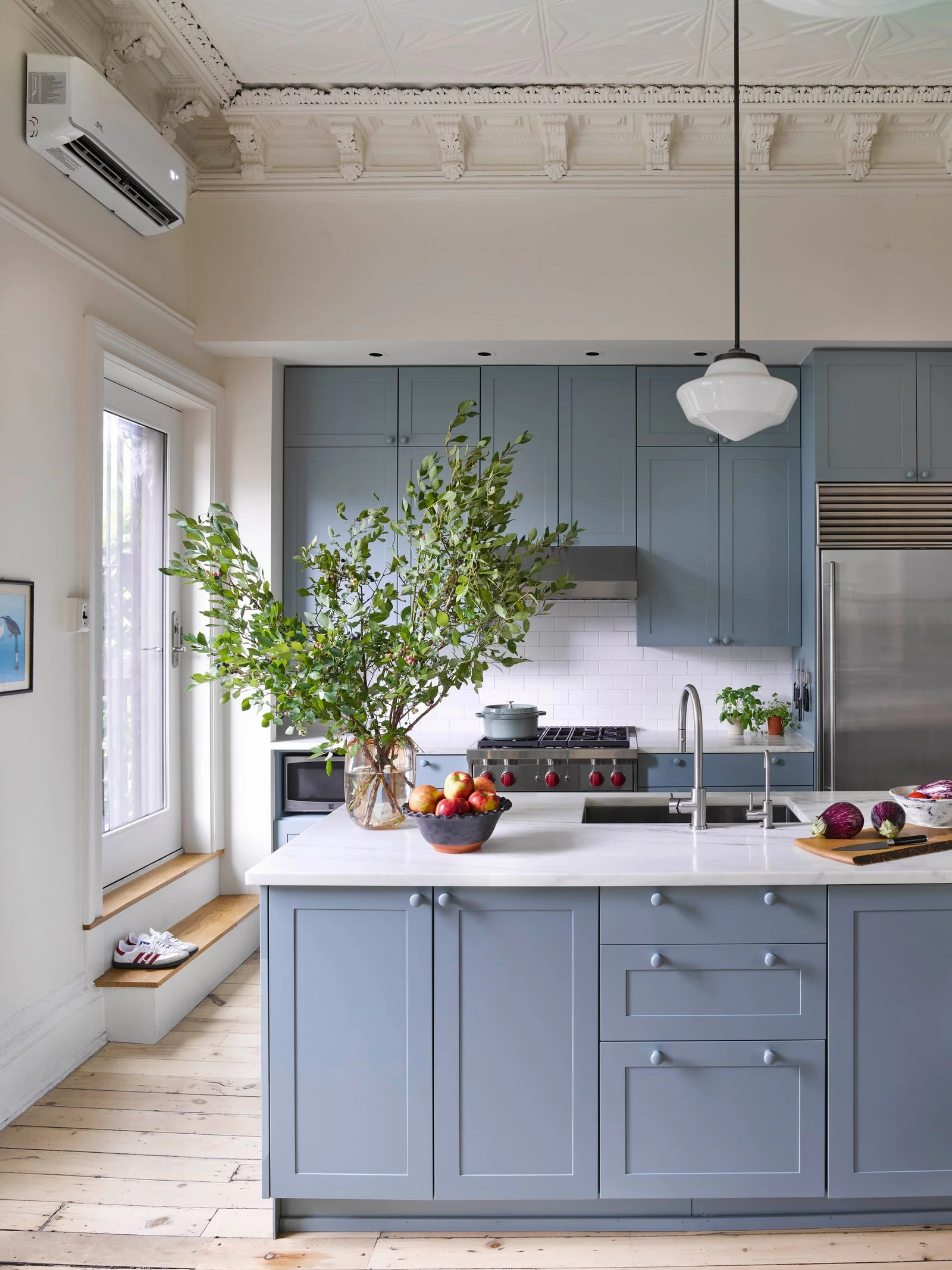 Image may contain Indoors Interior Design Kitchen and Kitchen Island
