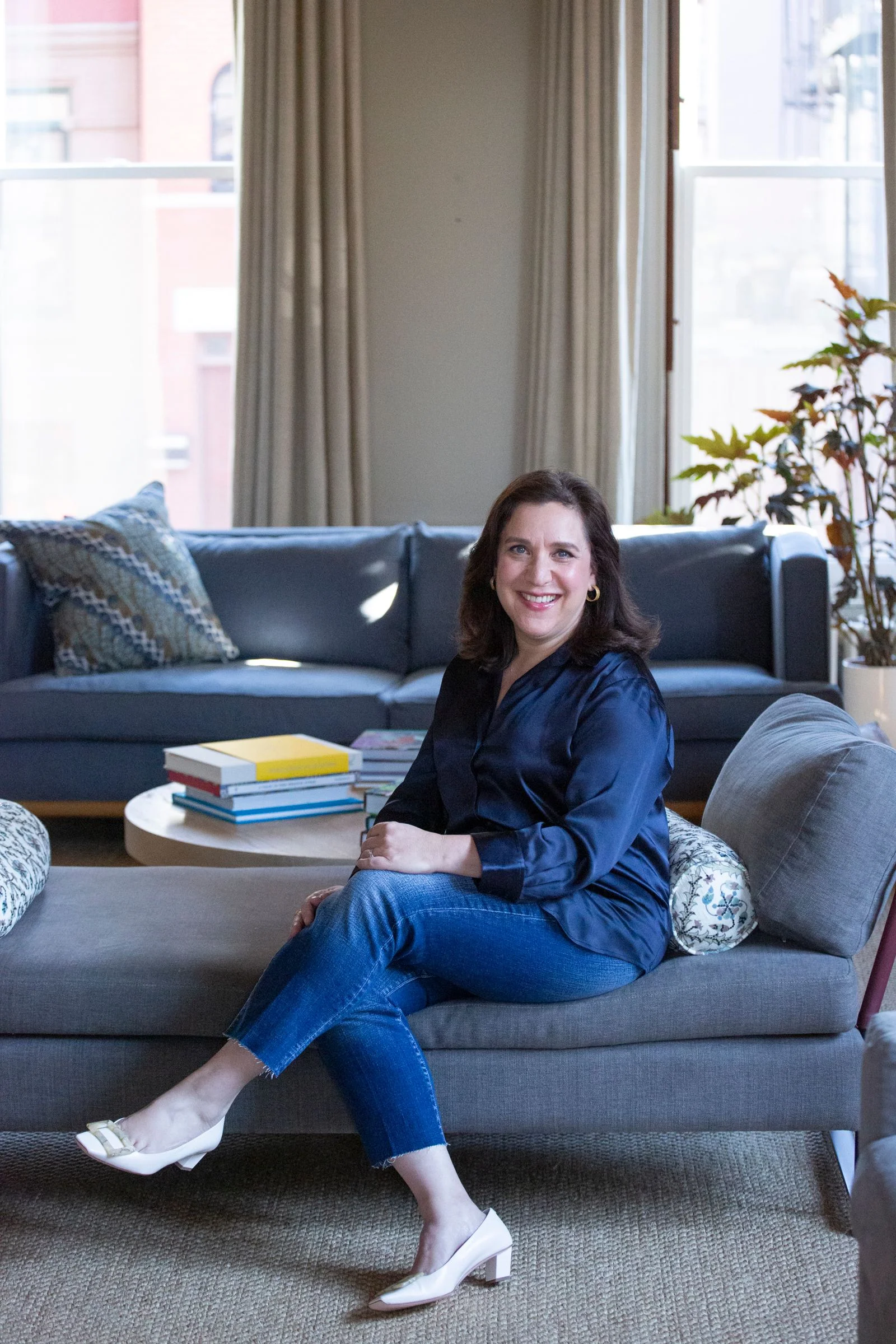 Image may contain Person Sitting Clothing Pants Teen Footwear High Heel Shoe Couch Furniture Face and Head