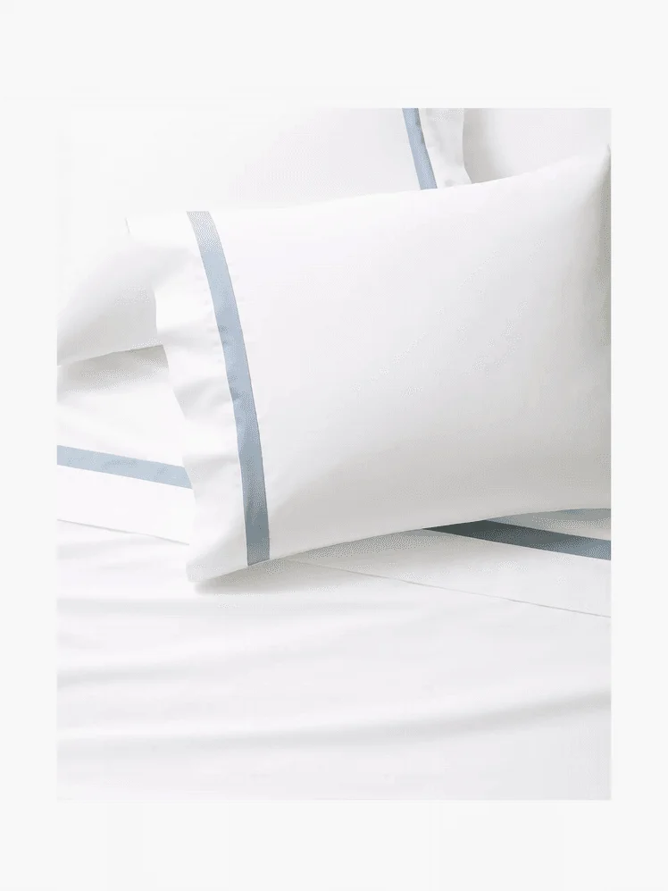 White sheets with a blue border stripe