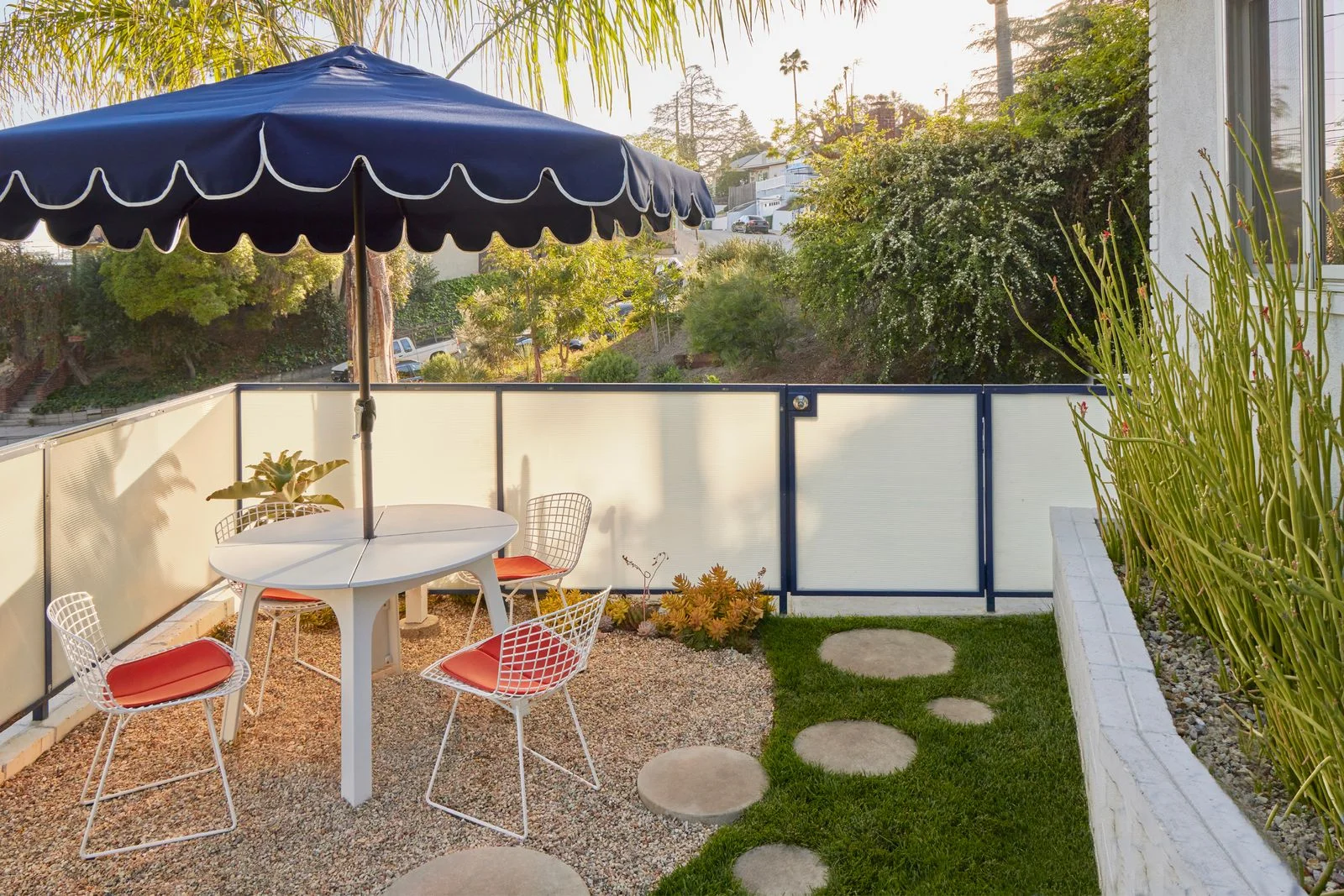 Image may contain Chair Furniture Desk Table Backyard Nature Outdoors Yard Indoors Interior Design and Grass