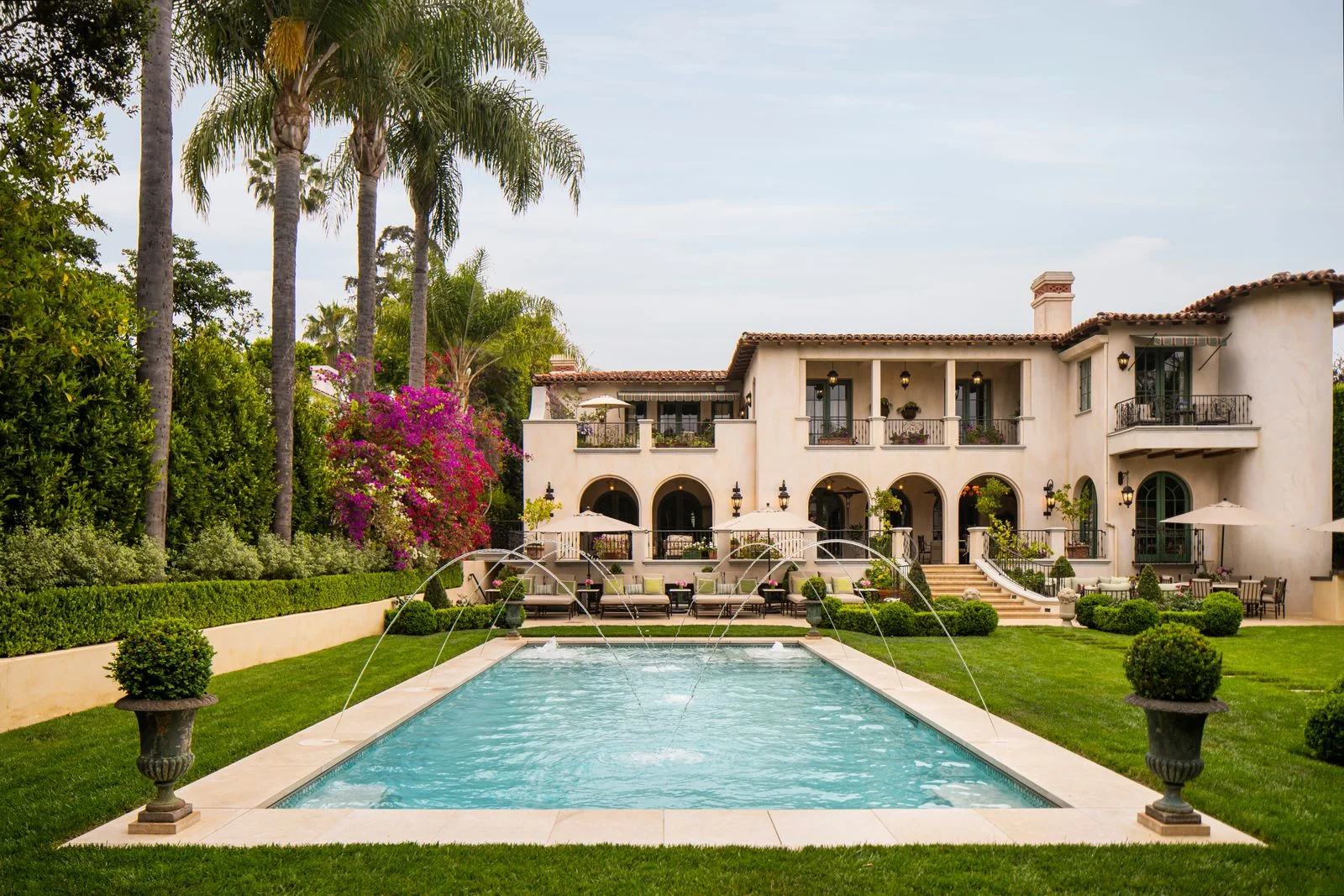 Image may contain Architecture Building House Housing Villa Plant Grass Pool Water Hacienda and Outdoors