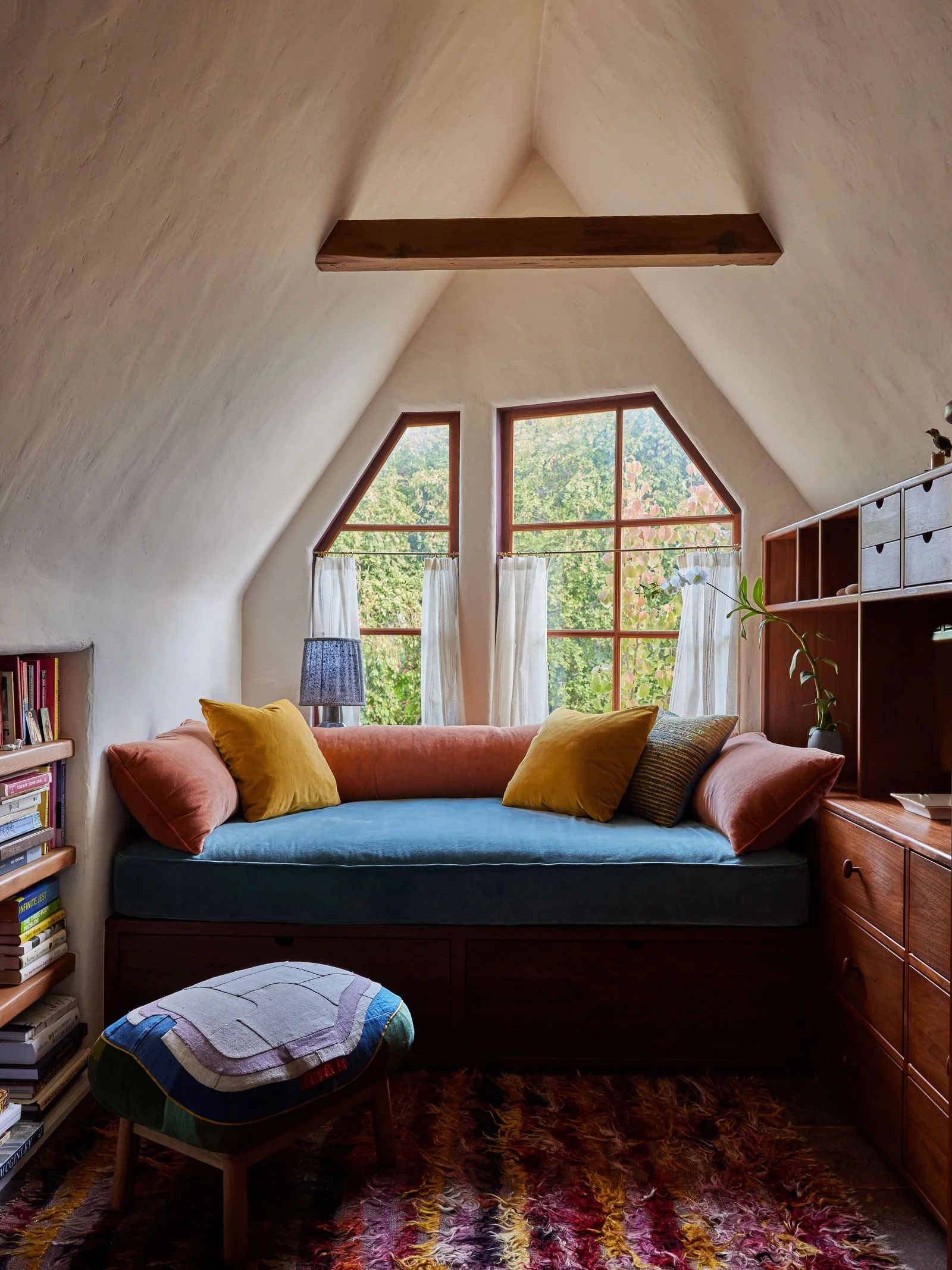 Image may contain Architecture Building House Housing Indoors Loft Room Home Decor Rug and Interior Design