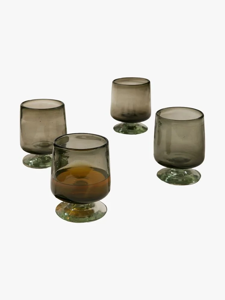 Image may contain: Glass, Goblet, Pottery, Jar, Smoke Pipe, and Candle