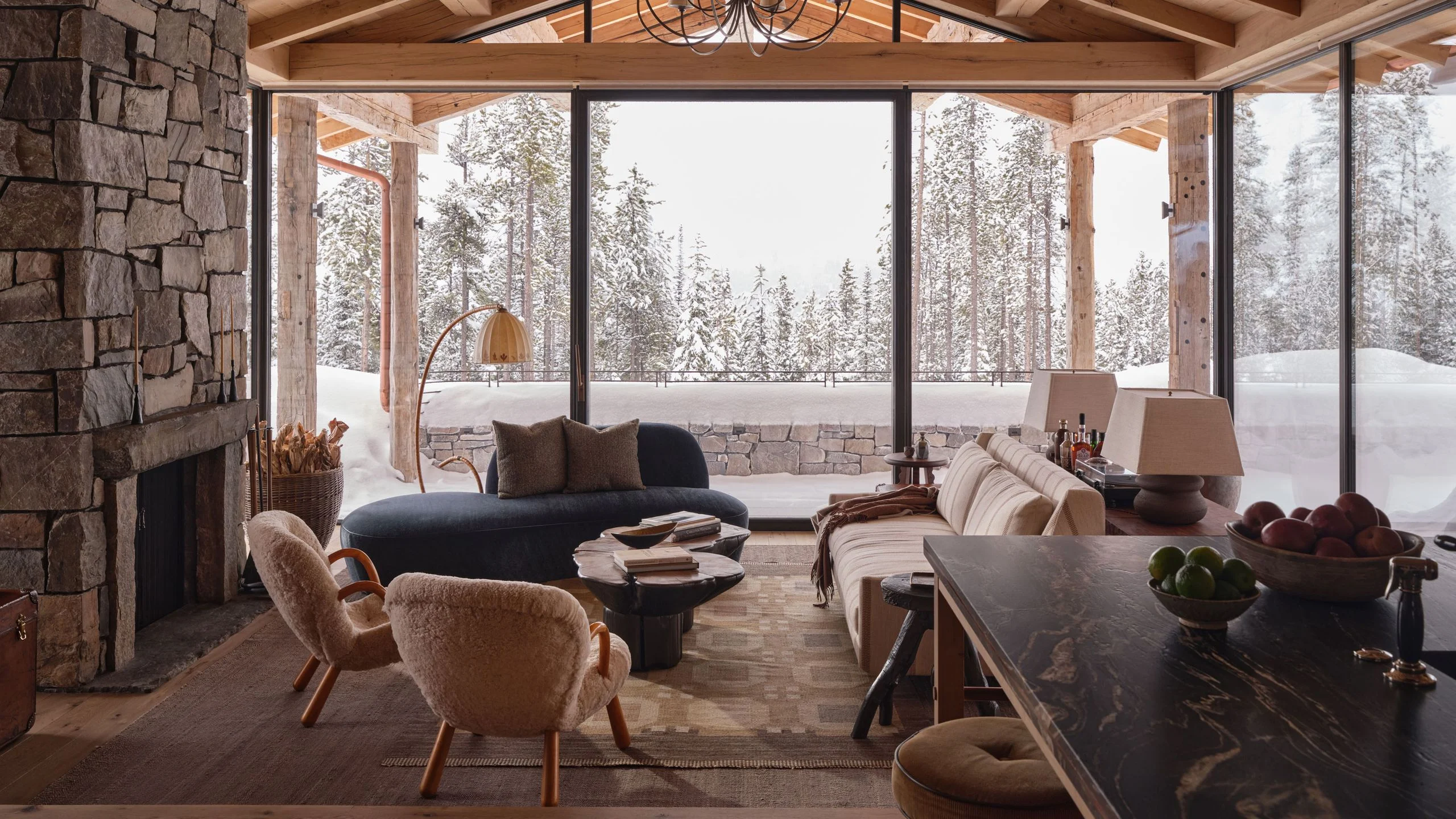 Image may contain Yellowstone Club Indoors Interior Design Furniture Couch Chandelier Lamp Home Decor Architecture and...