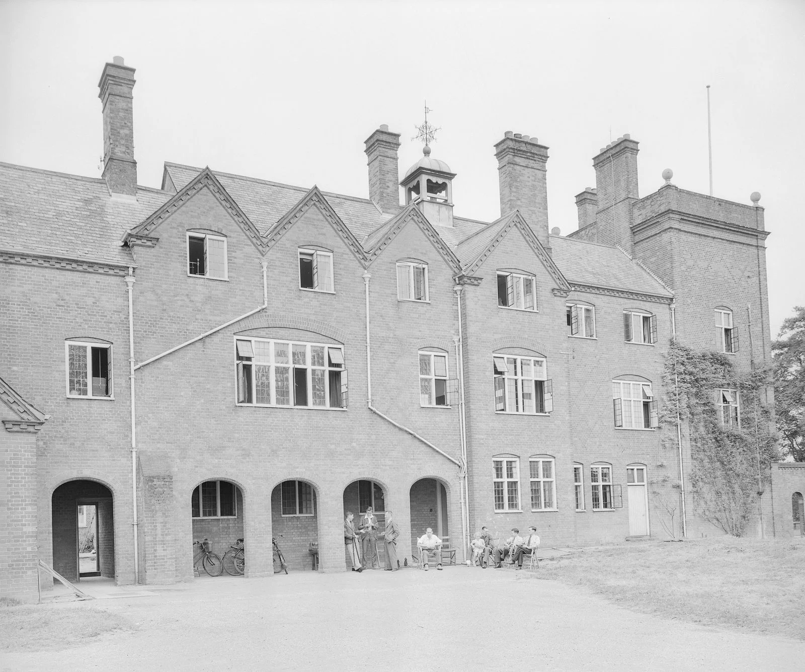 Image may contain Architecture Building Monastery Person Housing House Bicycle Transportation and Vehicle