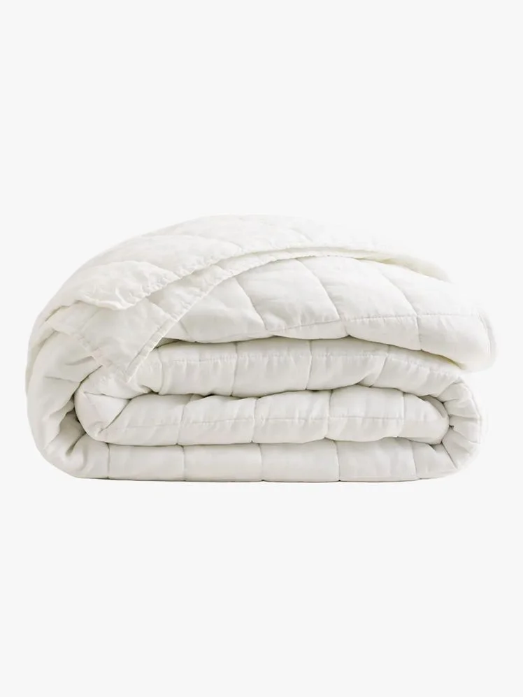 Image may contain: Blanket, Cushion, Home Decor, and Pillow