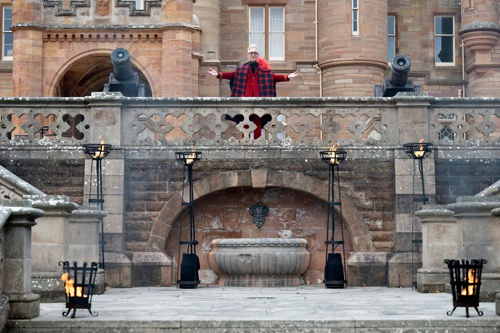 Image may contain Alan Cumming The Traitors Adult Person City Clothing Hat Performer Solo Performance Skirt and Tartan