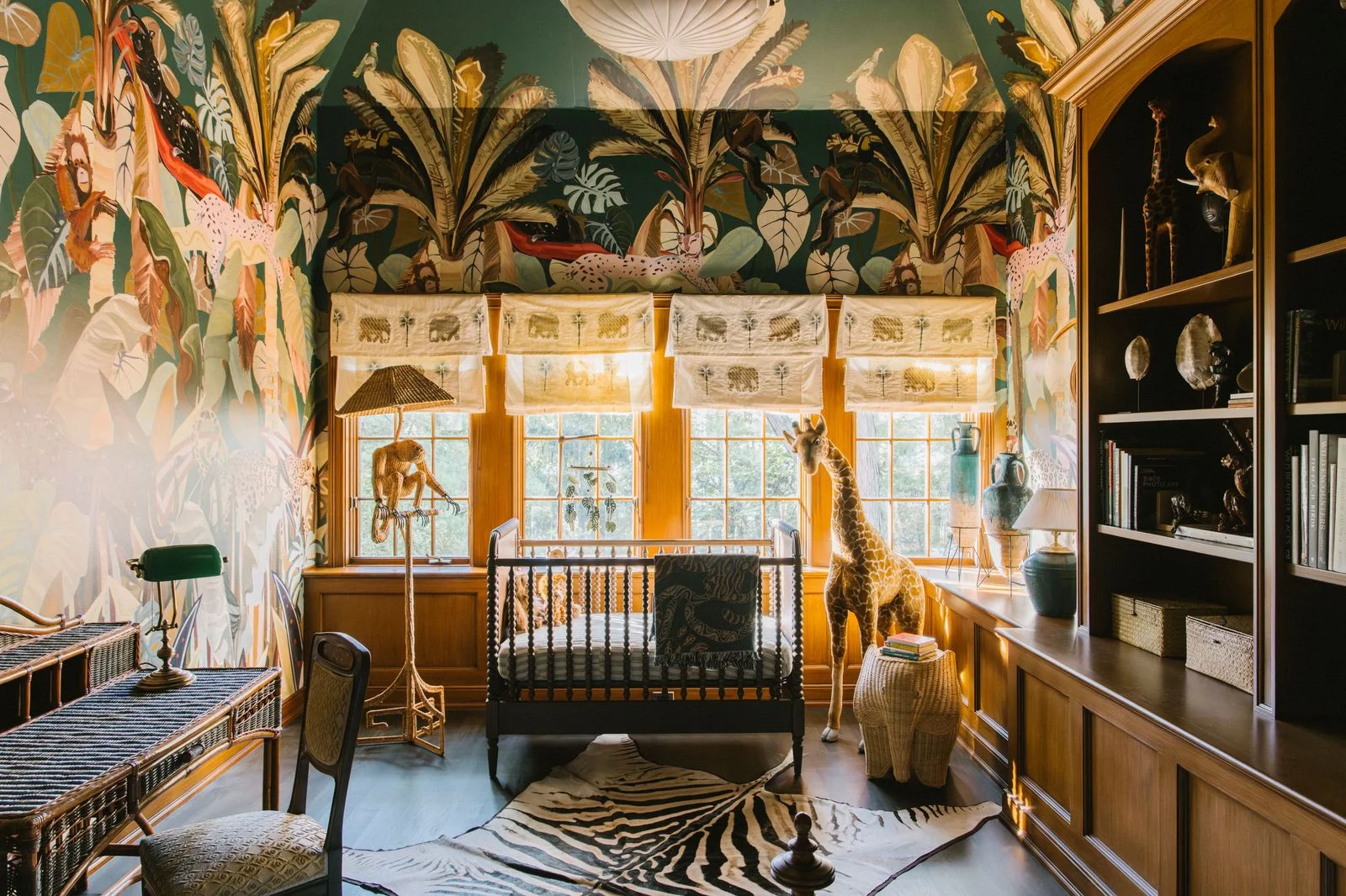 Image may contain Home Decor Indoors Crib Furniture Infant Bed Rug Animal Giraffe Mammal and Wildlife