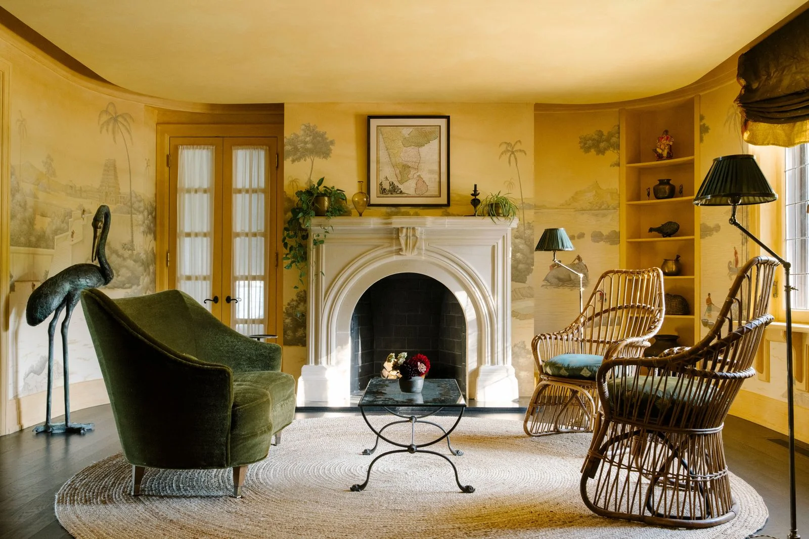 Image may contain Fireplace Indoors Hearth Furniture Home Decor Interior Design Chair and Plant