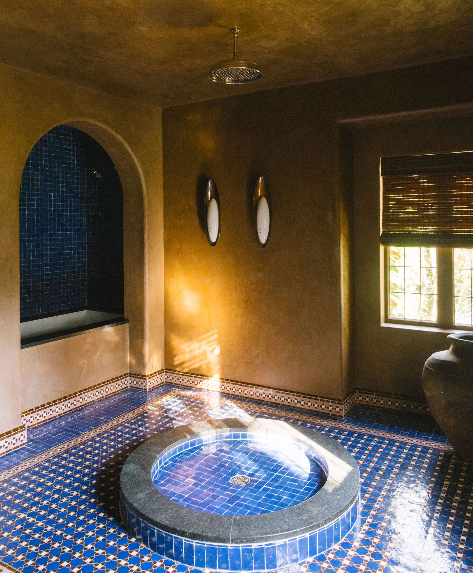 Image may contain Tub Hot Tub Bathroom Indoors Room and Shower Faucet