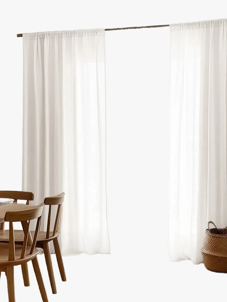 Image may contain: Chair, Furniture, Curtain, Home Decor, and Texture