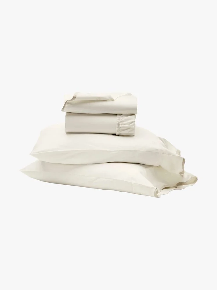 Image may contain: Cushion, Home Decor, Linen, Pillow, and Blanket