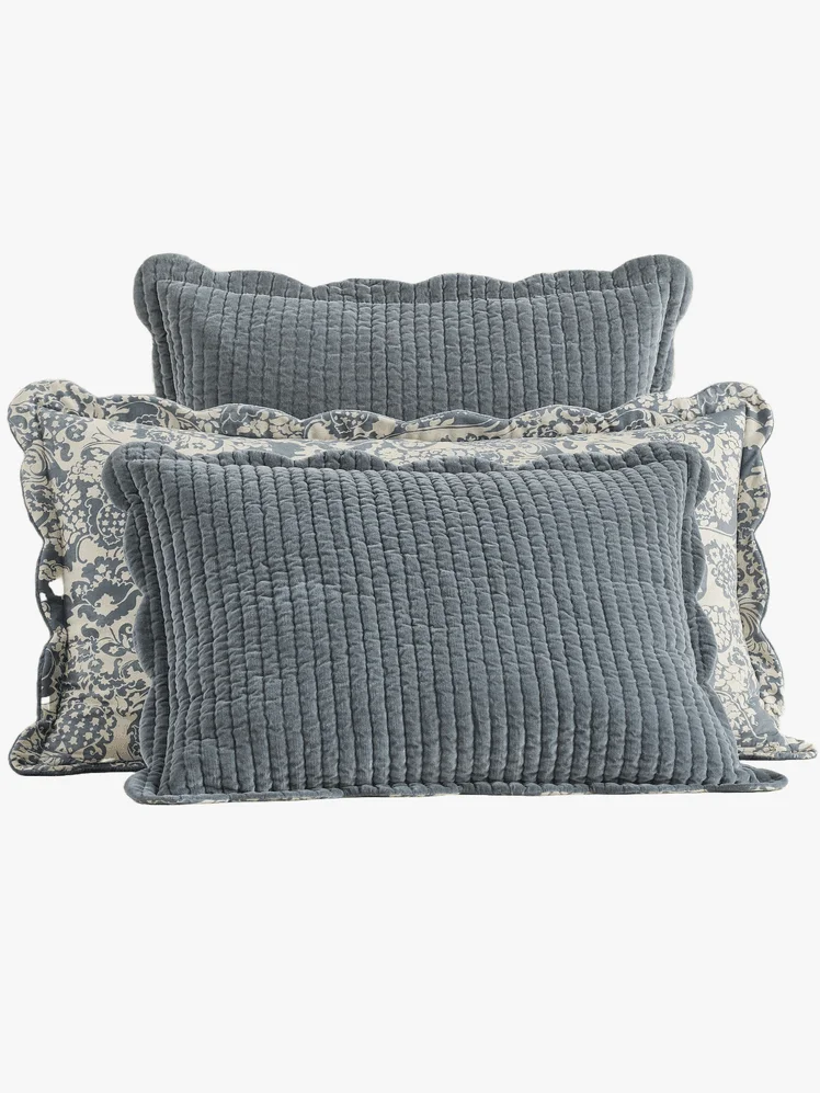 Three velvet pillowcases with ruffled edges 
