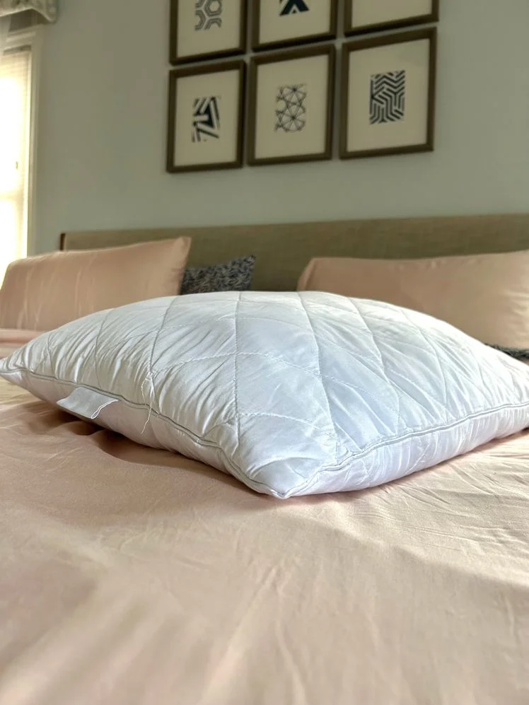 Image may contain: Cushion, Home Decor, Pillow, Bed, and Furniture