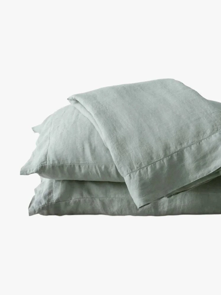 Image may contain: Cushion, Home Decor, Linen, Pillow, and Blanket