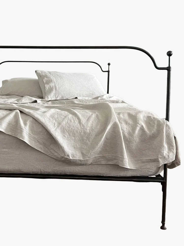 Image may contain: Home Decor, Linen, Furniture, Cushion, and Bed