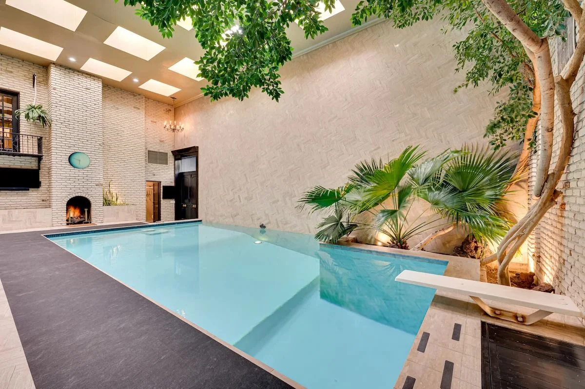 Image may contain Pool Water Swimming Pool Outdoors Aerial View and Lamp