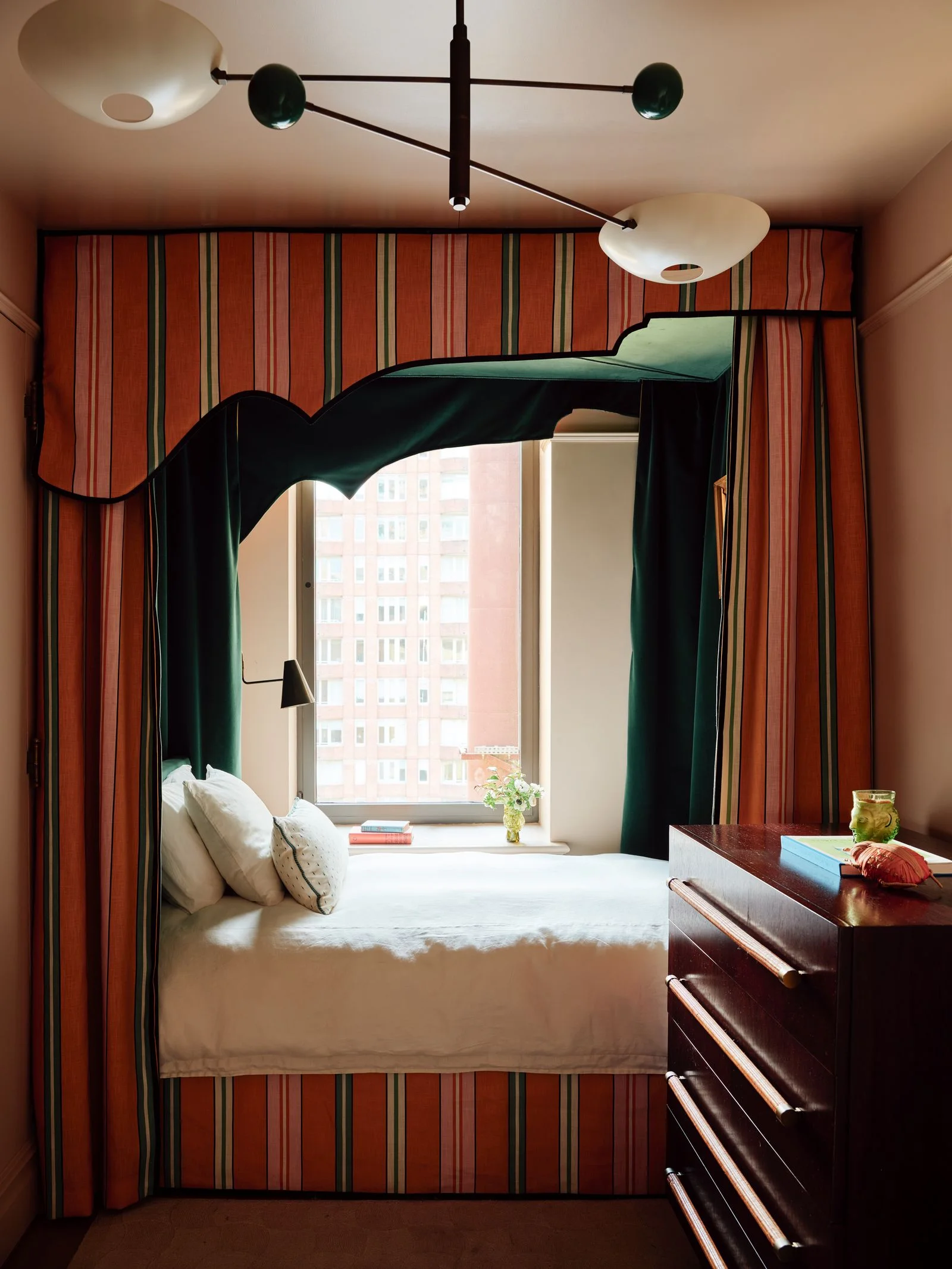 Image may contain Furniture Bed Bedroom Indoors Room Interior Design and Window