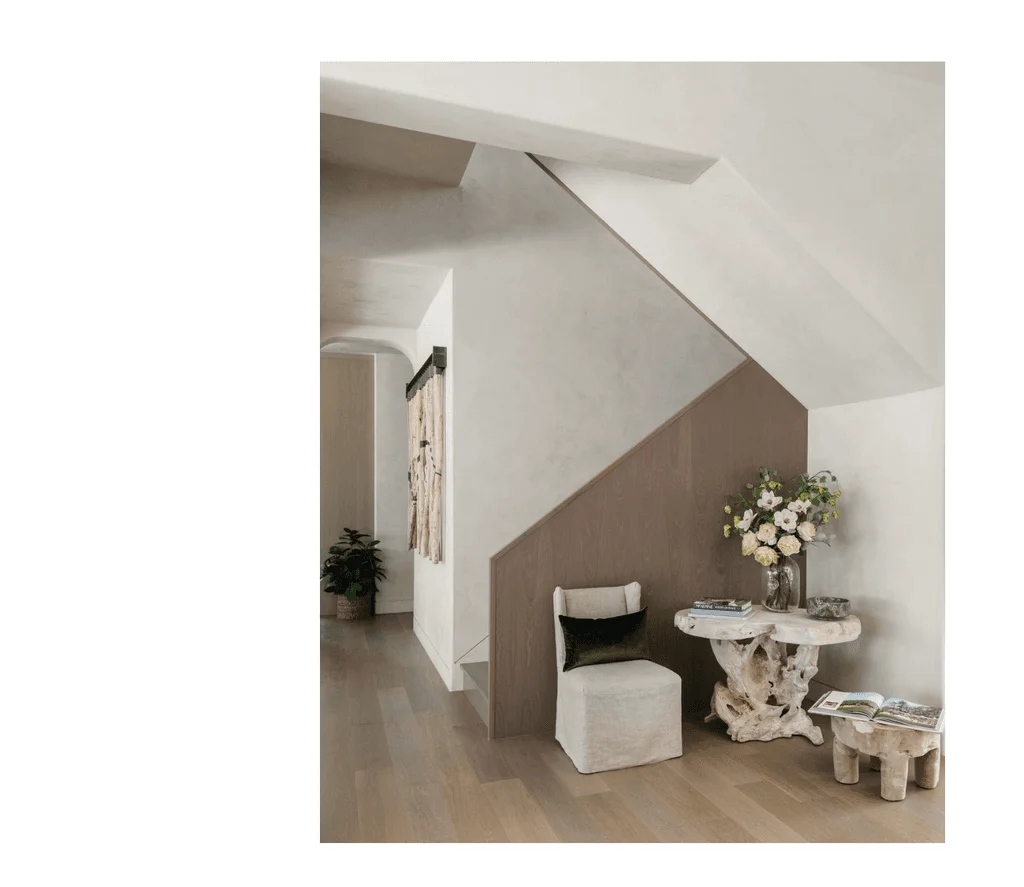 Image may contain Indoors Interior Design Architecture Building House Housing Staircase and Flower