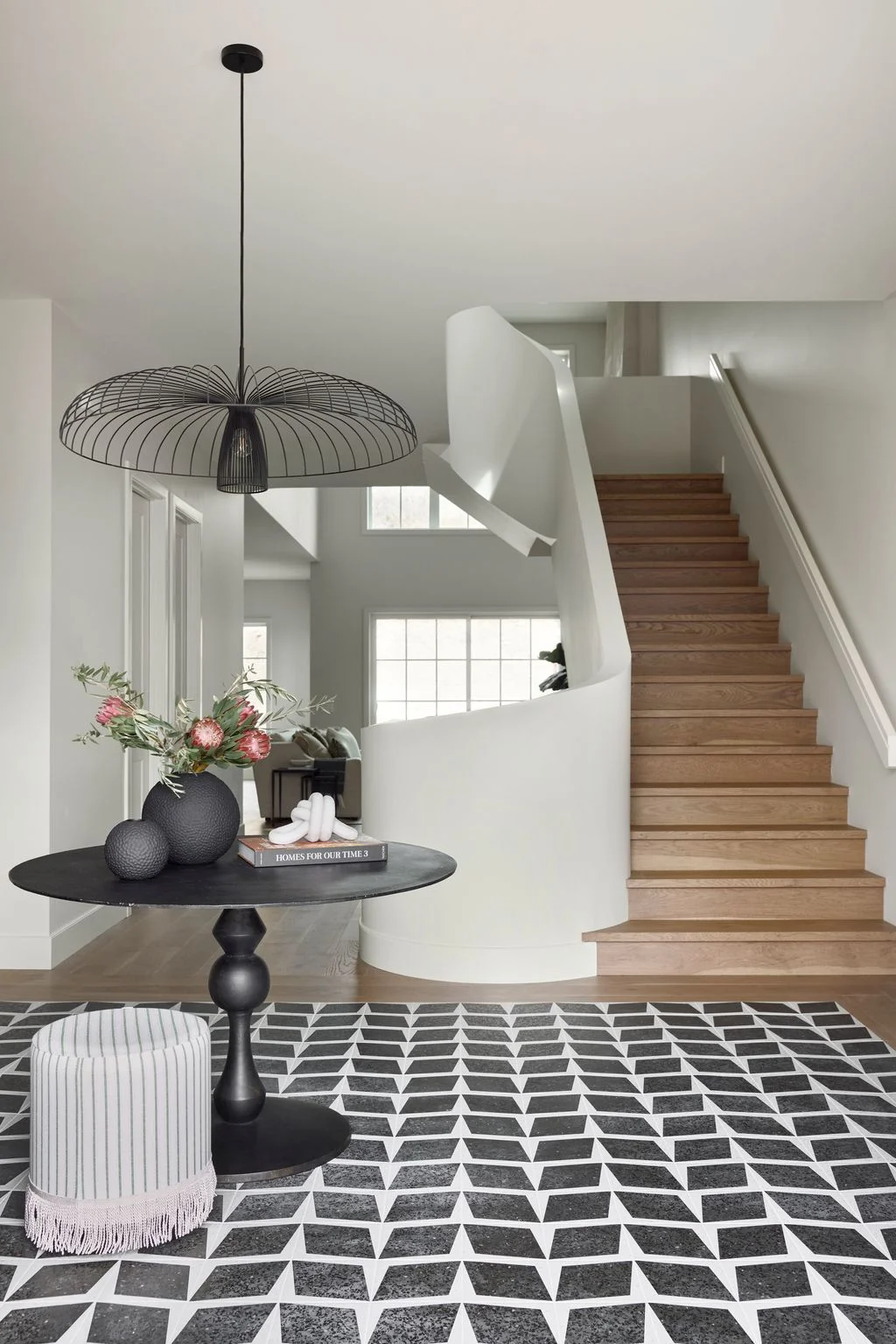 Image may contain Lamp Architecture Building Foyer Indoors House Housing and Staircase