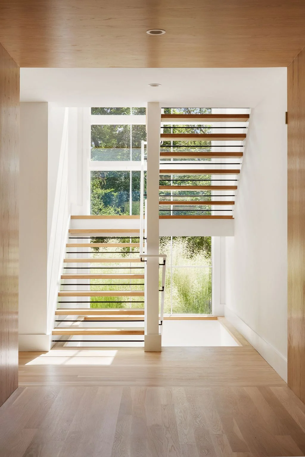 Image may contain Indoors Interior Design Architecture Building House Housing Staircase Window and Door