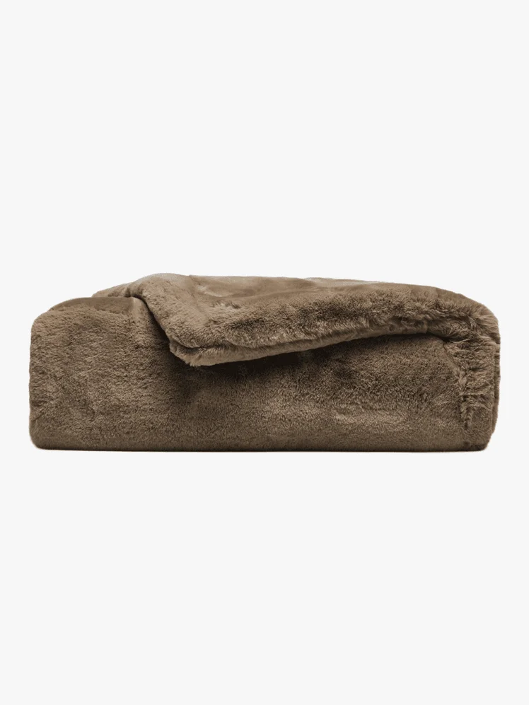 A brown fuzzy weighted blanket 