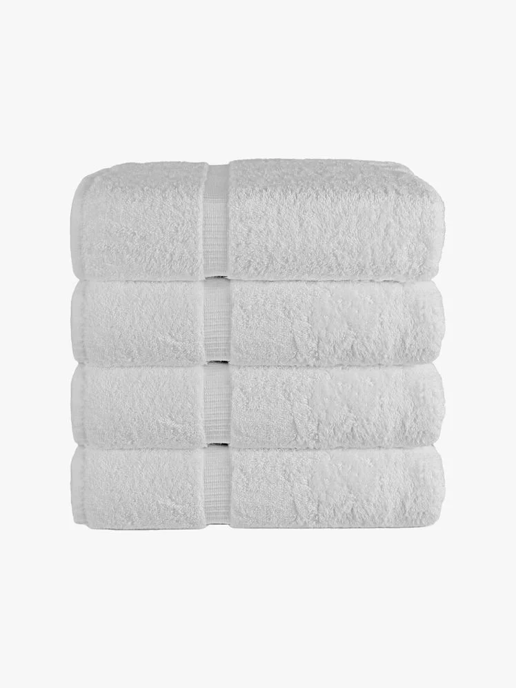 Folded set of 4 white towels.