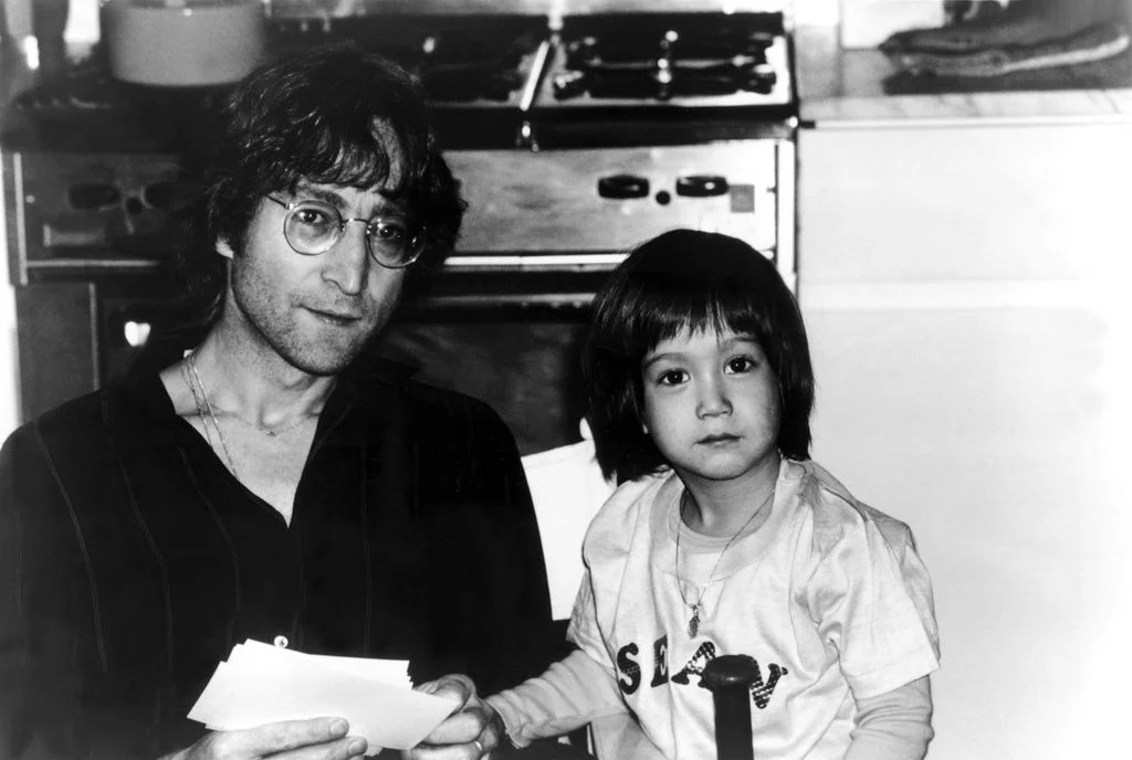 Image may contain John Lennon Sean Lennon Face Head Person Photography Portrait Child Adult and Accessories