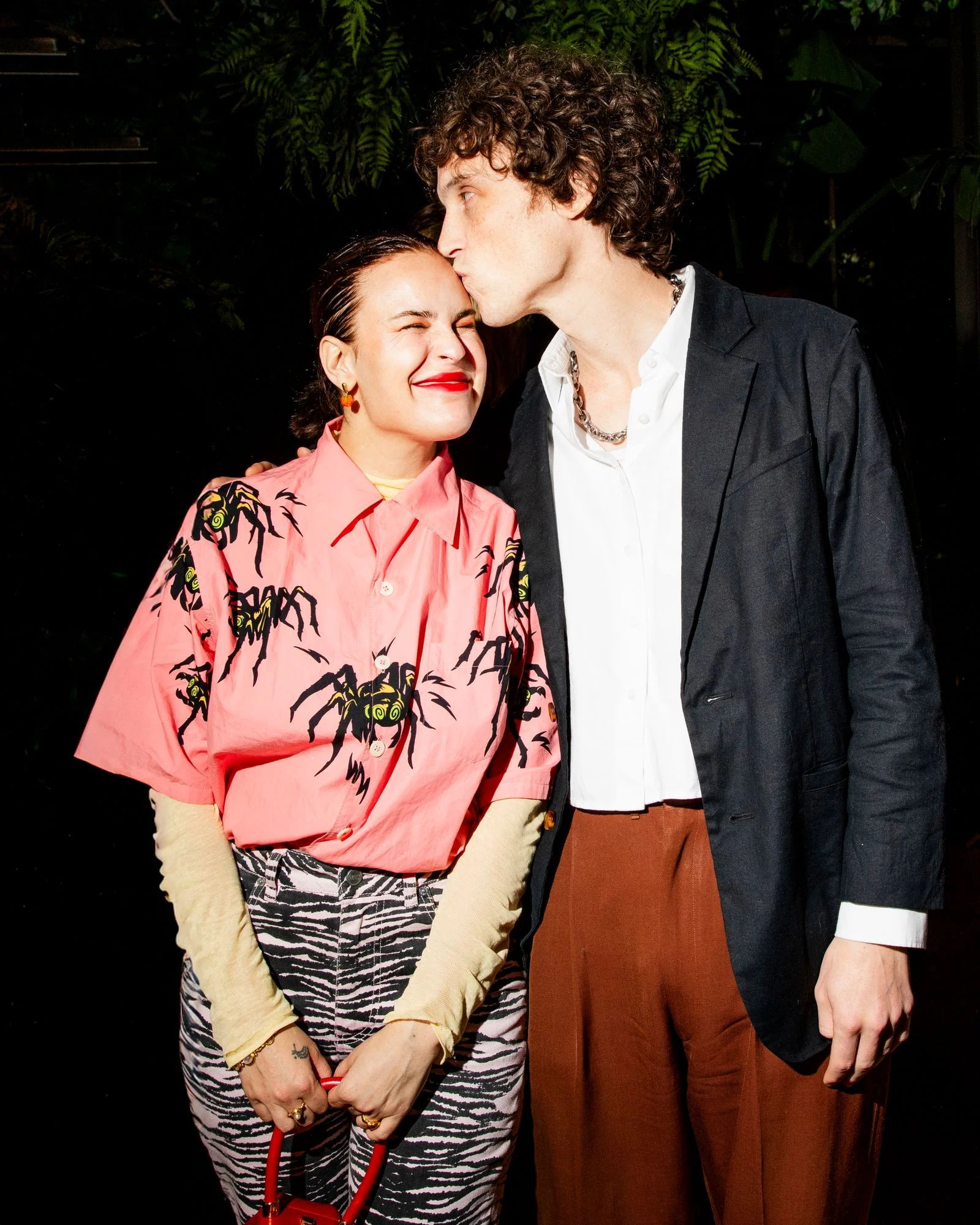 Image may contain Blazer Clothing Coat Jacket Blouse Face Head Person Photography Portrait Adult and Romantic