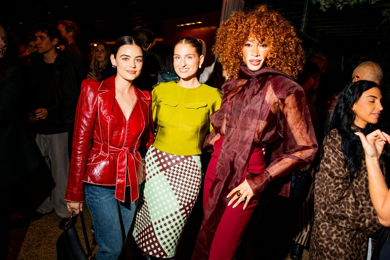 Image may contain Lucy Hale Meghan Trainor Adult Person Clothing Coat Face Head and Jacket