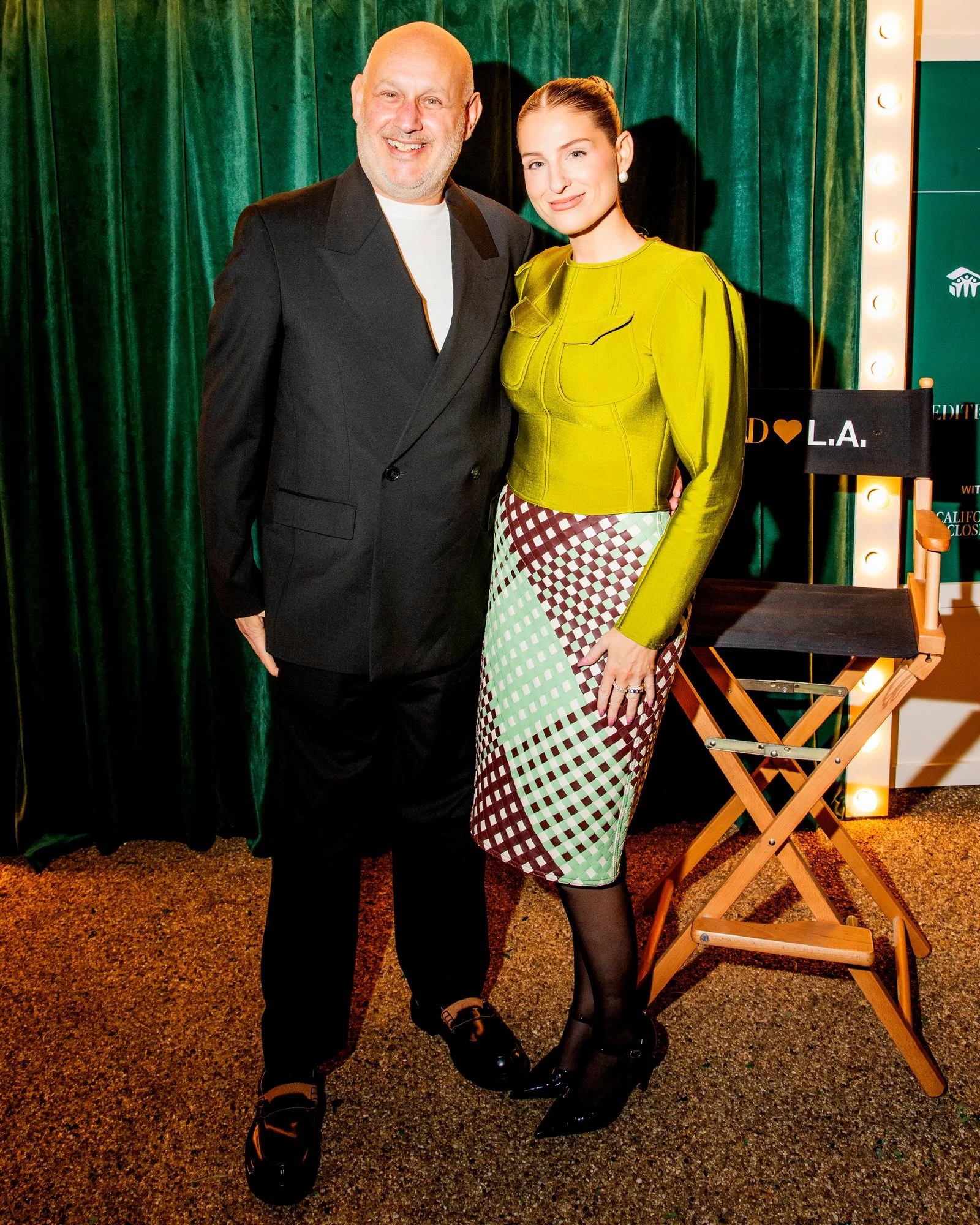 Image may contain Meghan Trainor Blazer Clothing Coat Jacket Skirt Formal Wear Suit Photography Face and Head