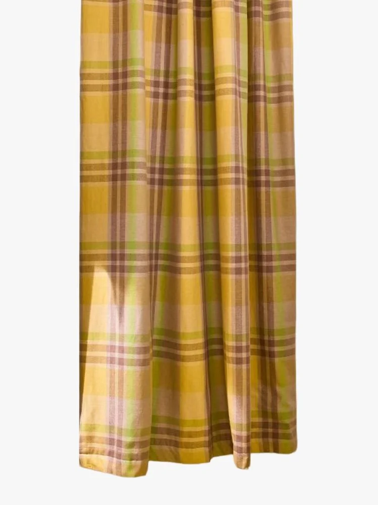 Image may contain: Curtain, Shower Curtain, Clothing, and Skirt