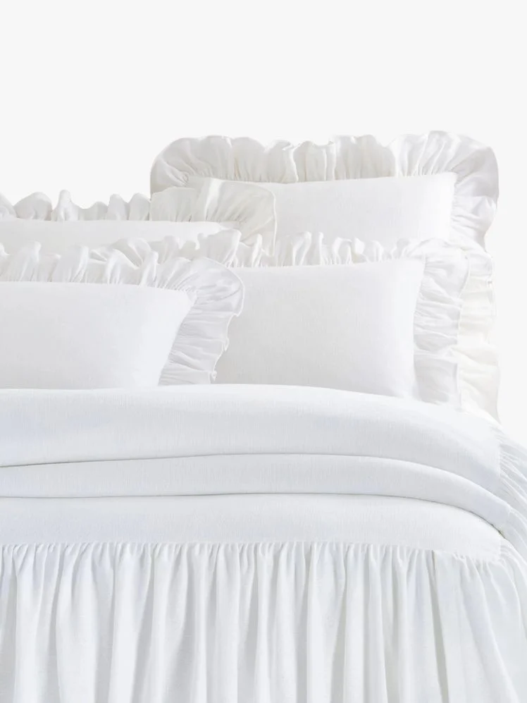 Image may contain: Cushion, Home Decor, Furniture, Bed, and Pillow