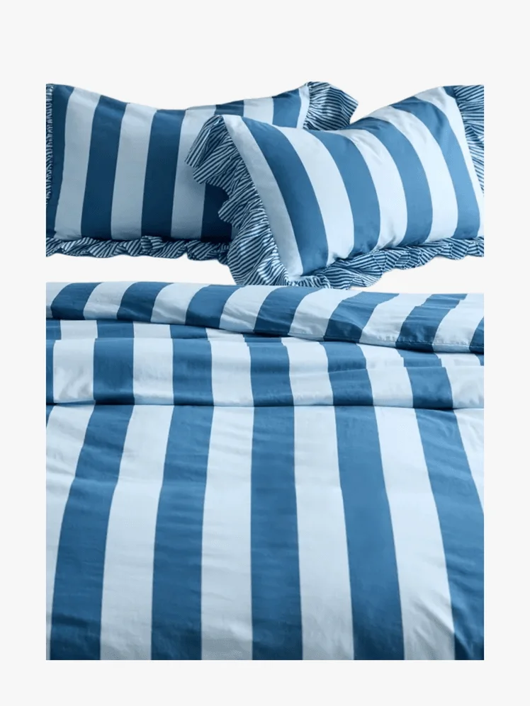 Image may contain: Cushion, Home Decor, Furniture, Bed, and Bed Sheet