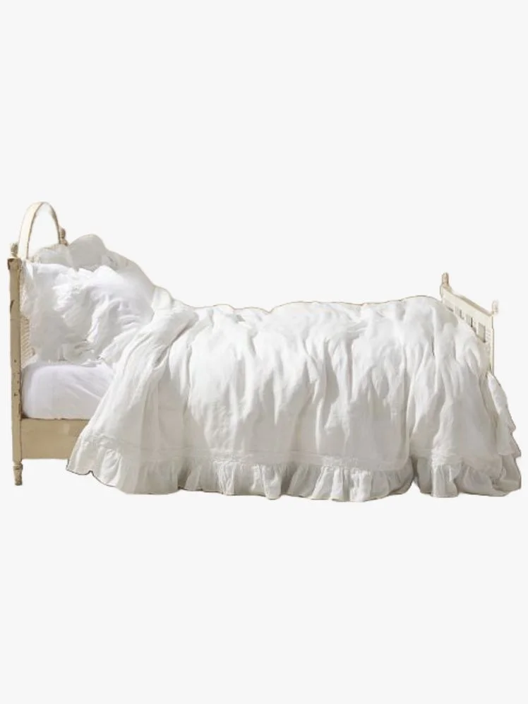 Image may contain: Furniture, Cushion, Home Decor, Bed, and Linen