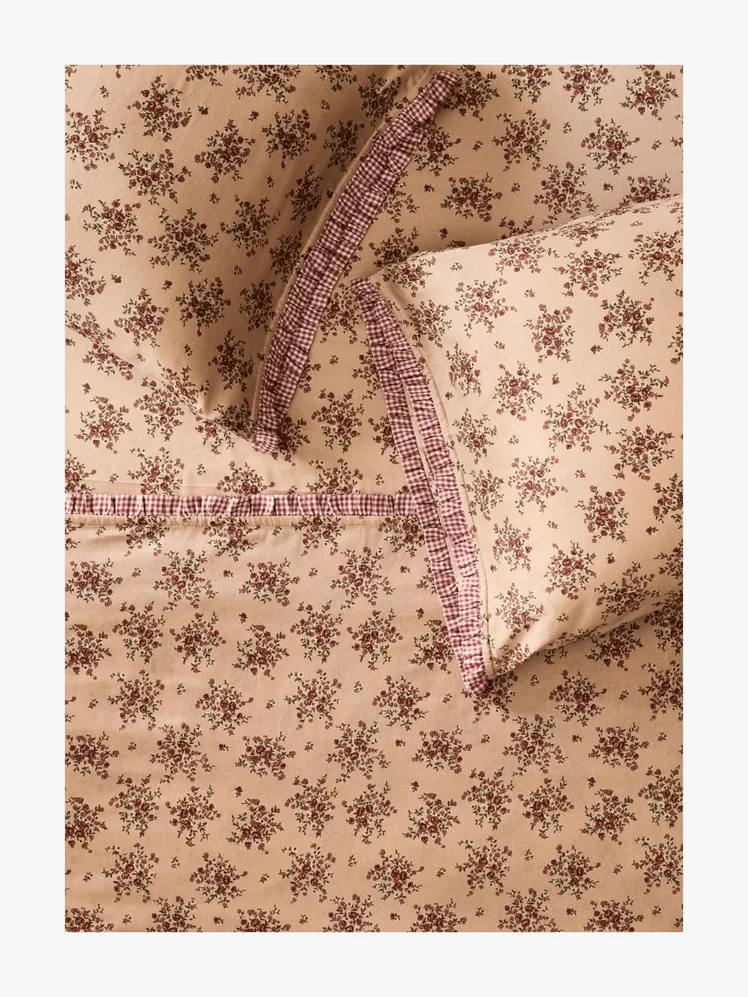 Image may contain: Home Decor, Cushion, Furniture, Bed, and Bed Sheet