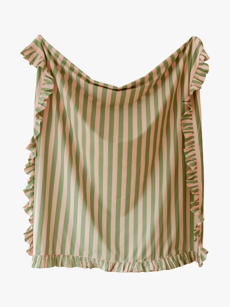 Image may contain: Blouse, Clothing, Cushion, and Home Decor