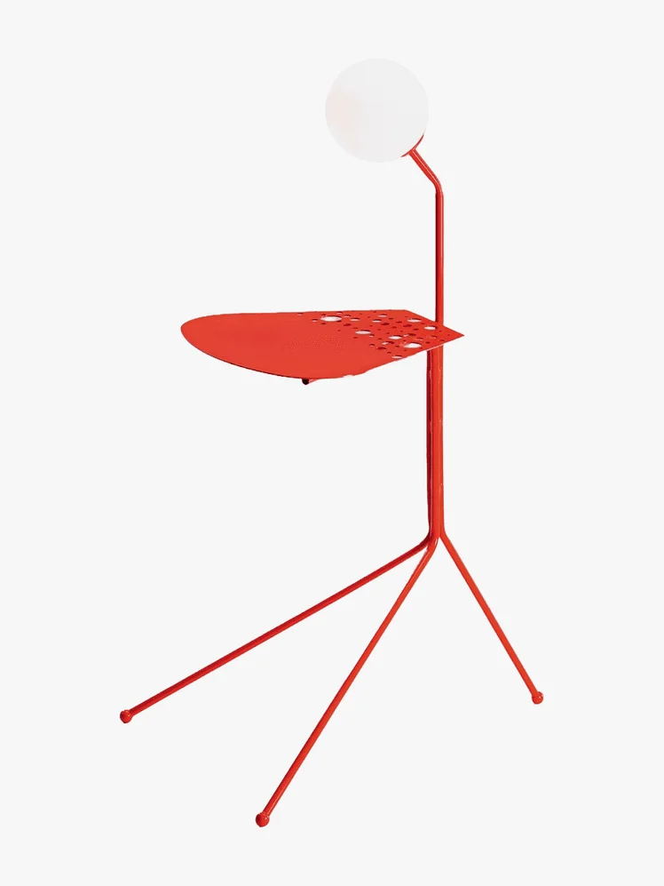 Image may contain: Lamp, Furniture, and Table