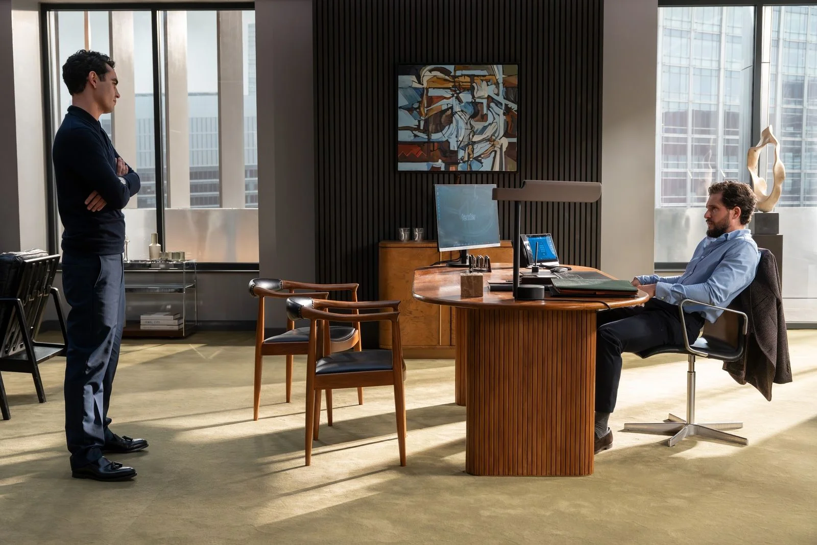 Image may contain Indoors Interior Design Furniture Table Wood Desk Chair Hardwood Stained Wood and Wood Panels