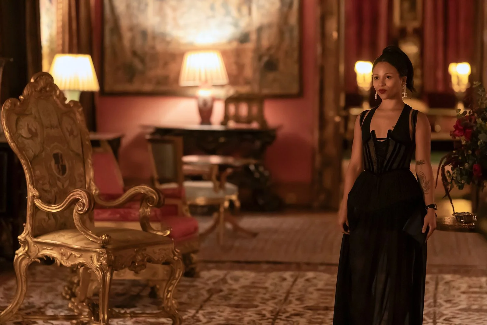 Image may contain Lamp Table Lamp Person Lighting and Adult