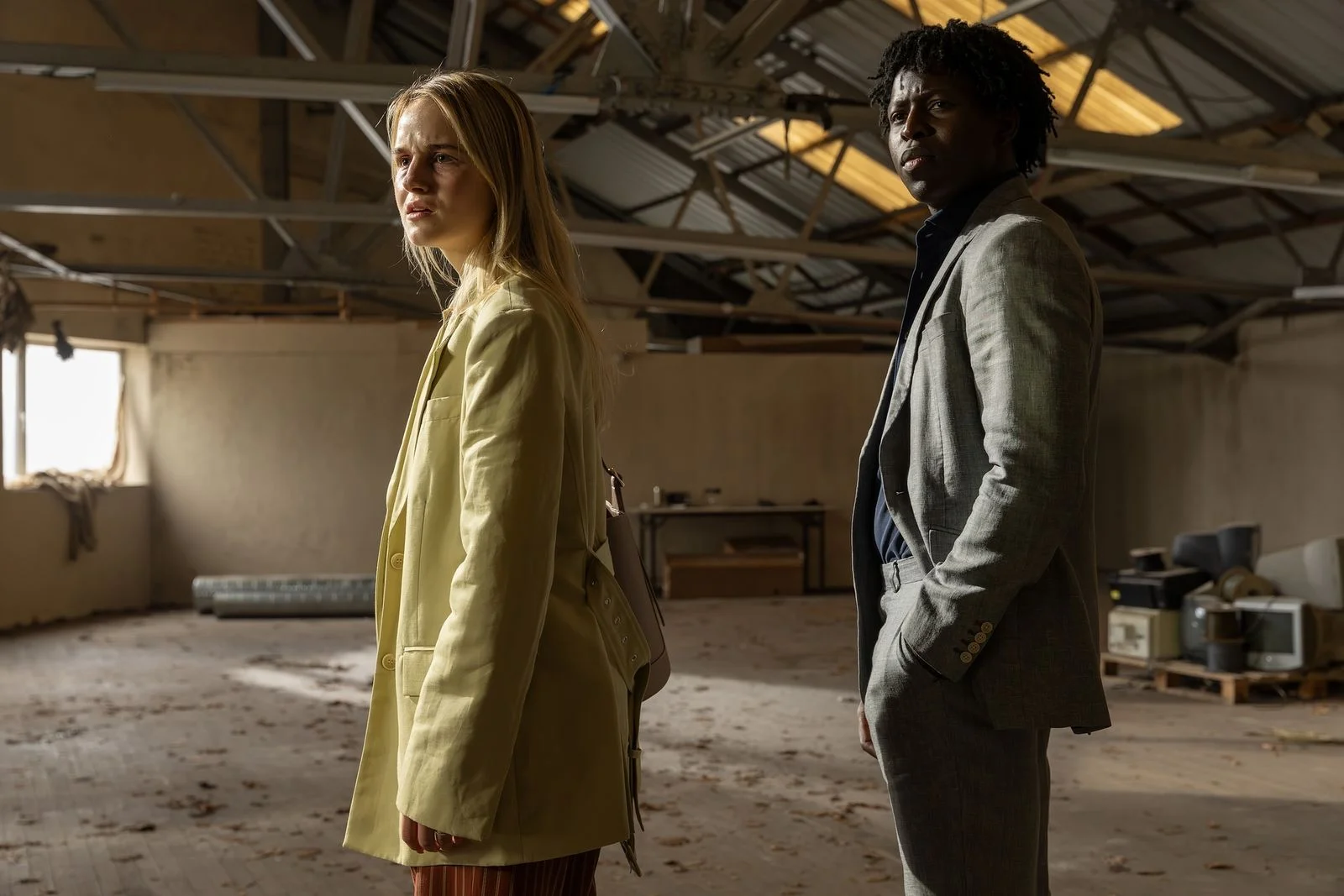 Image may contain Clothing Coat Blonde Hair Person Face Happy Head Smile Adult Overcoat and Jacket