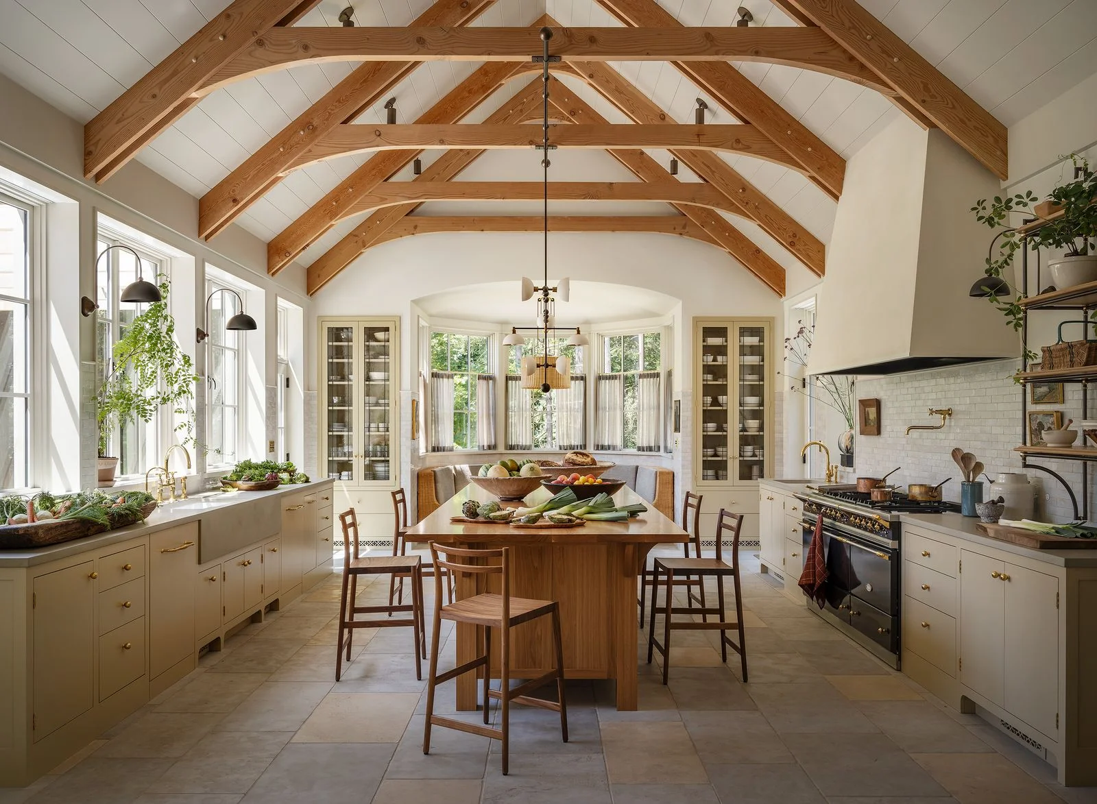 Image may contain Architecture Vault Ceiling Indoors Interior Design Wood Floor Kitchen and Window