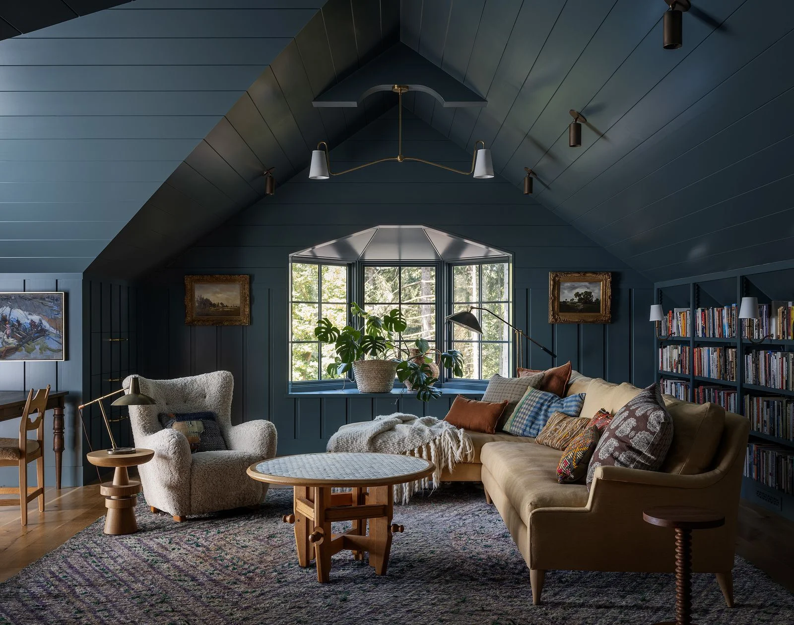 Image may contain Home Decor Furniture Table Couch Indoors Interior Design Plant Coffee Table and Architecture