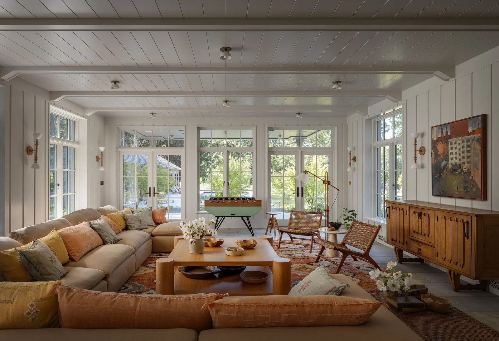 Image may contain Home Decor Furniture Table Coffee Table Door Indoors Interior Design Window and Couch