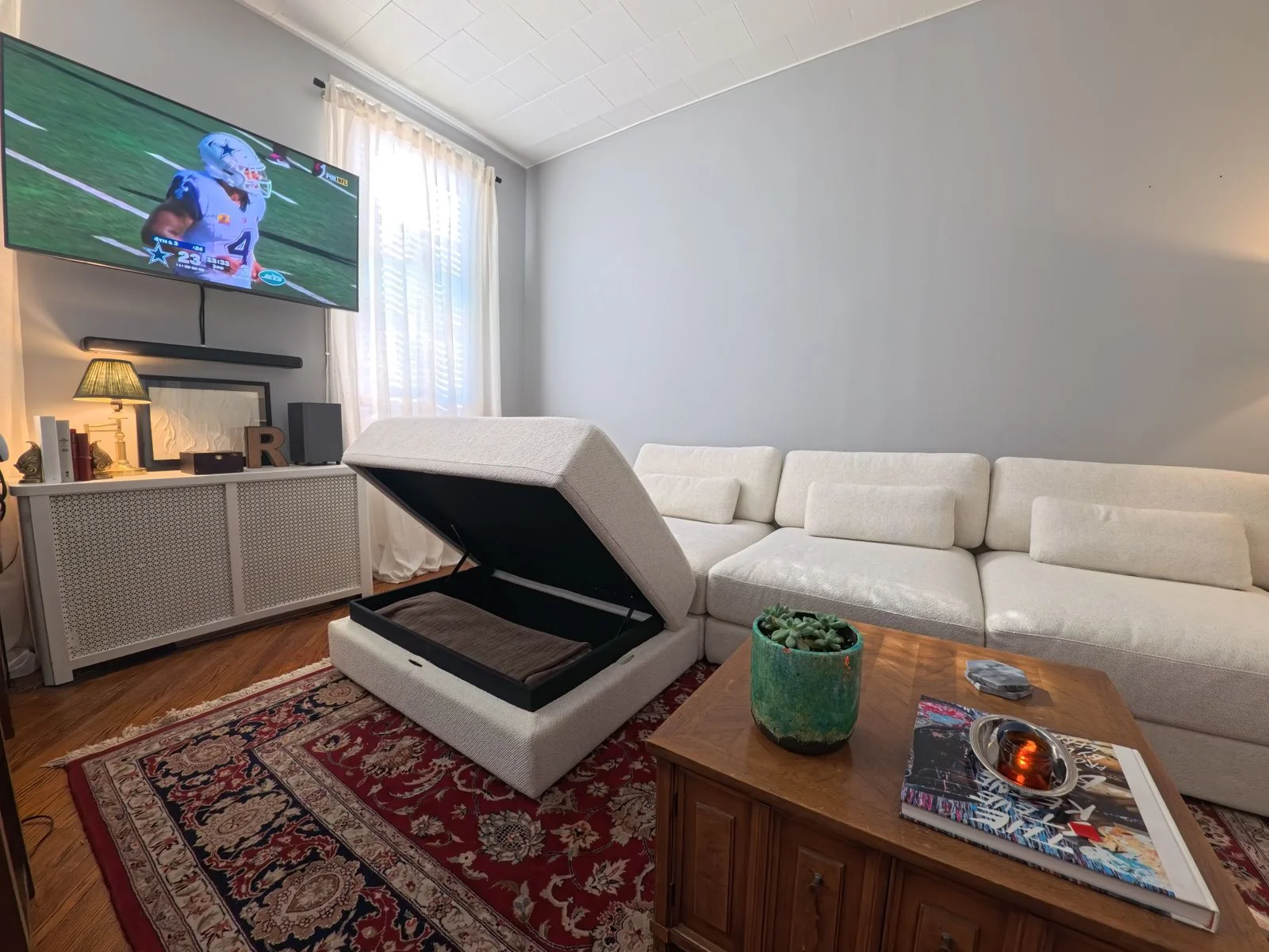 Image may contain Home Decor Electronics Speaker Furniture Plant Architecture Building Indoors Living Room and Room