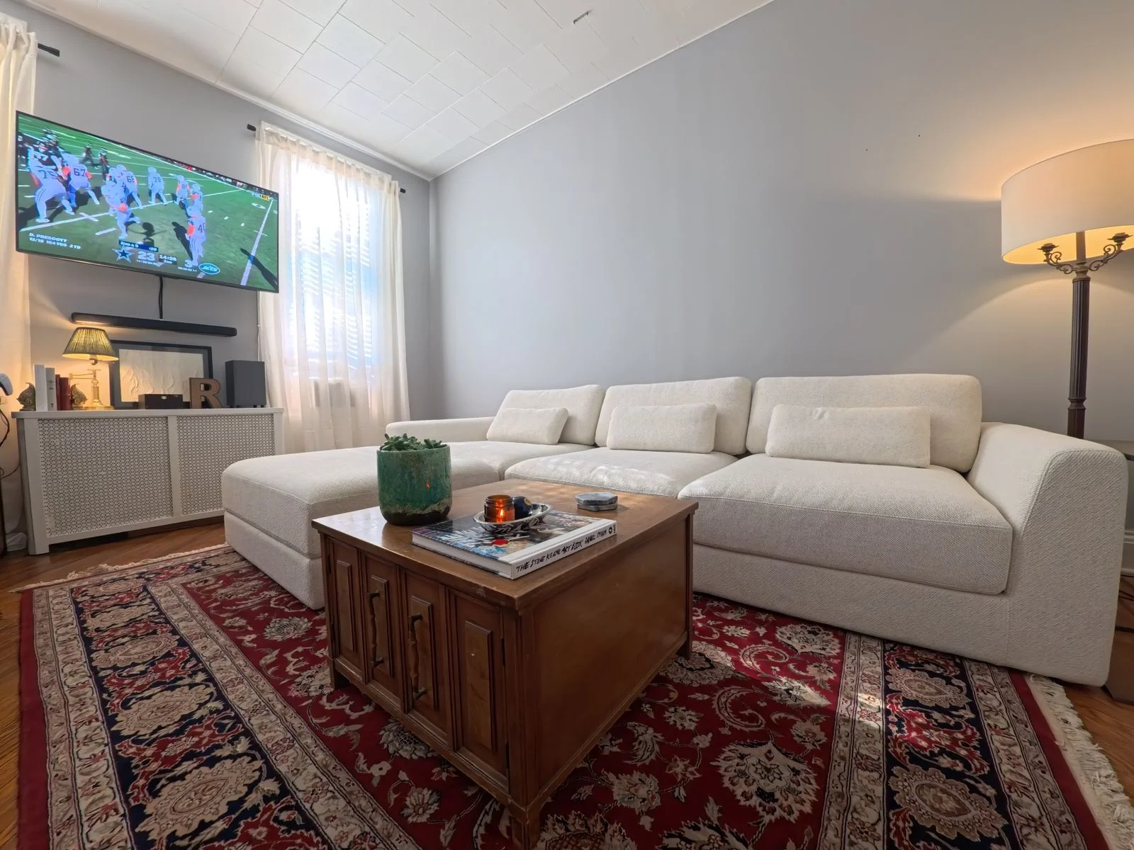 Image may contain Home Decor Couch Furniture Coffee Table Table Architecture Building Indoors Living Room and Room