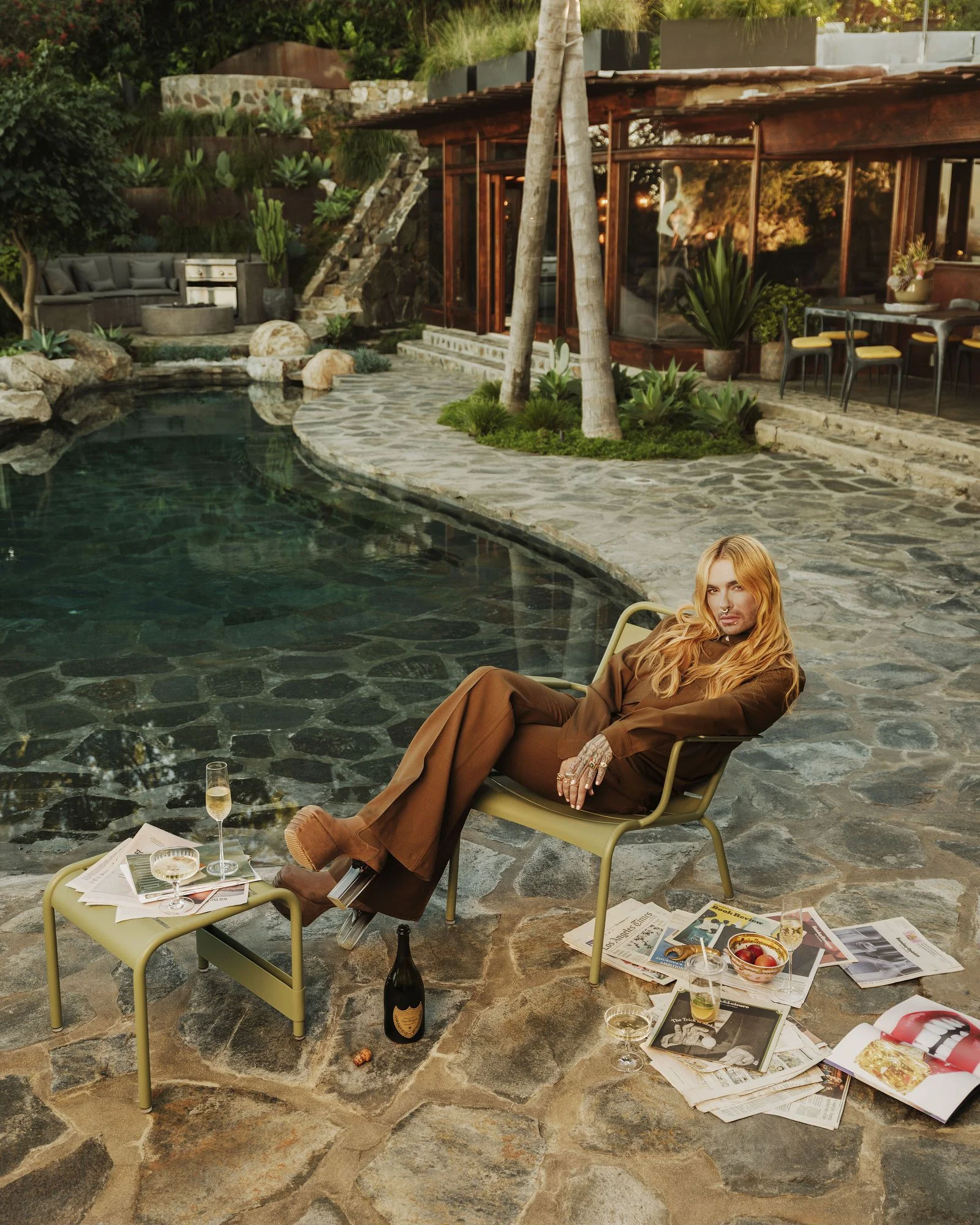 Image may contain Person Sitting Adult Chair Furniture Plant and Couch Bill Kaulitz