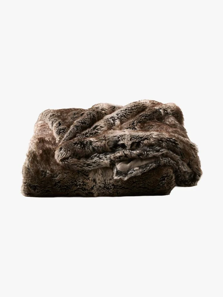 Image may contain: Blanket, Animal, Bear, Mammal, and Wildlife