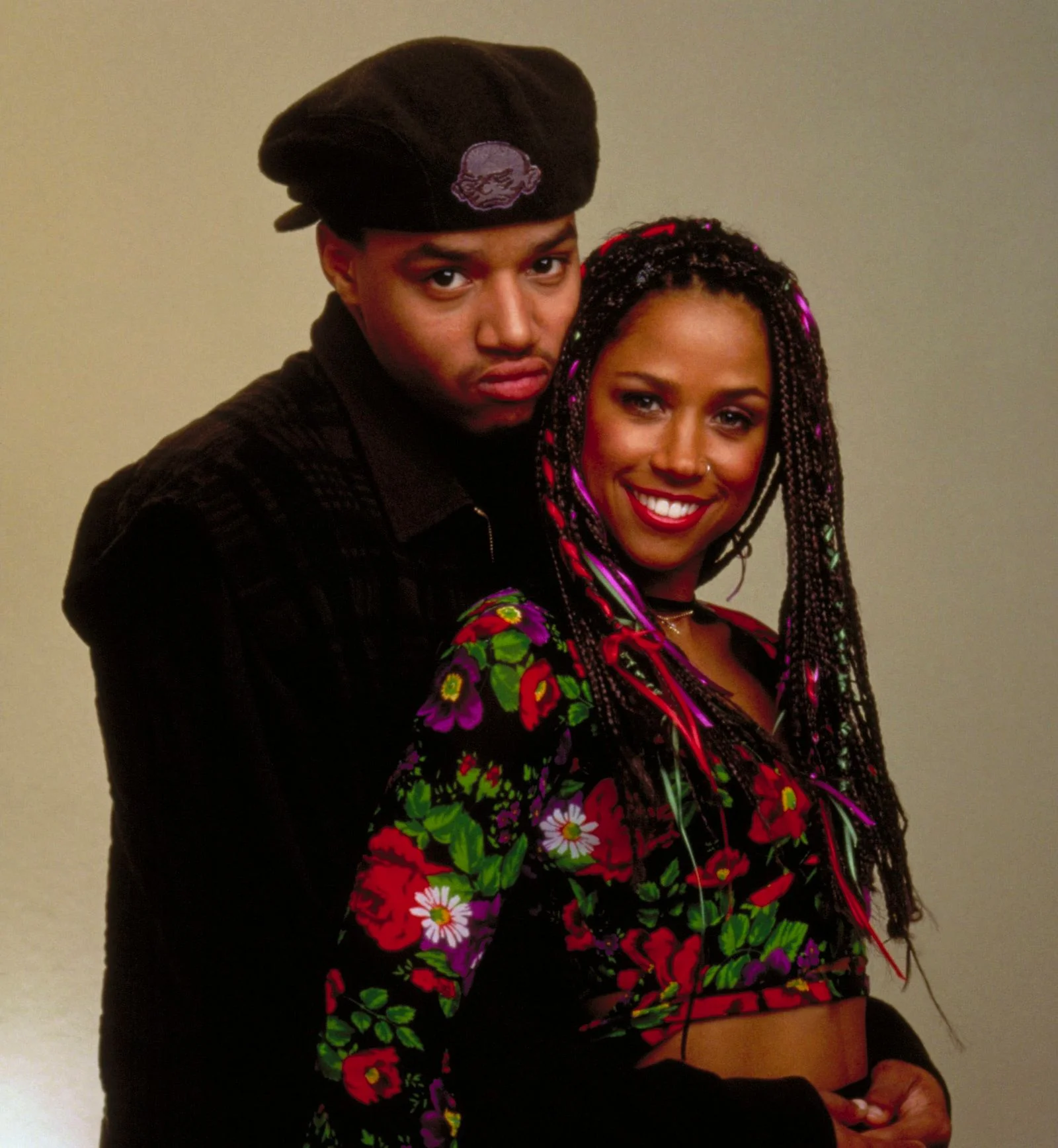 Image may contain Donald Faison Stacey Dash Face Head Person Photography Portrait Adult Clothing Hat and Coat