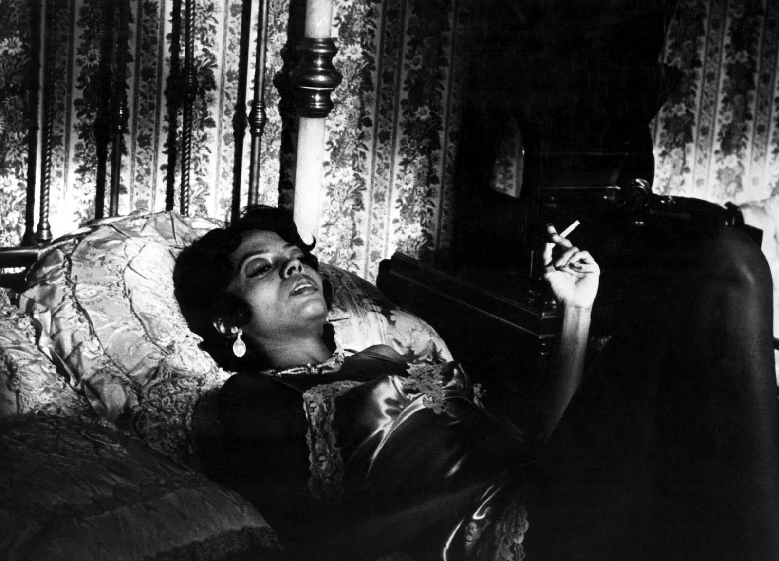 Image may contain Diana Ross Head Person Face Photography Portrait Smoke Adult Smoking and Candle